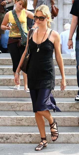 Illustration for article titled Halle Berry Brings Out The Baby • Hugh Jackman Goes Java